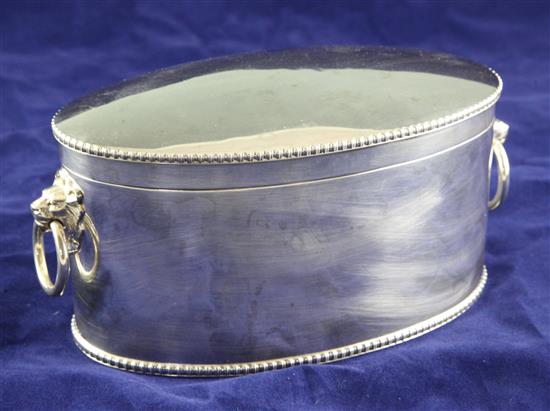 A George V silver oval biscuit box, 25 oz.